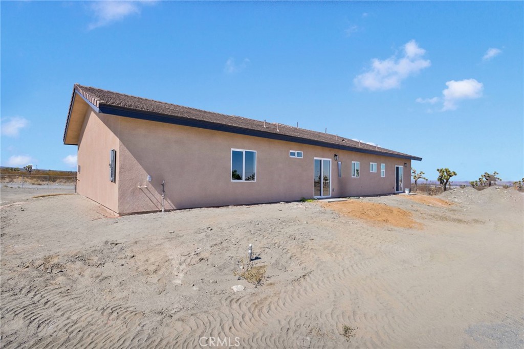 12015 Rosado Road Pinon Hills, CA 92372 - Photo 37 of 43 a house with a outdoor space