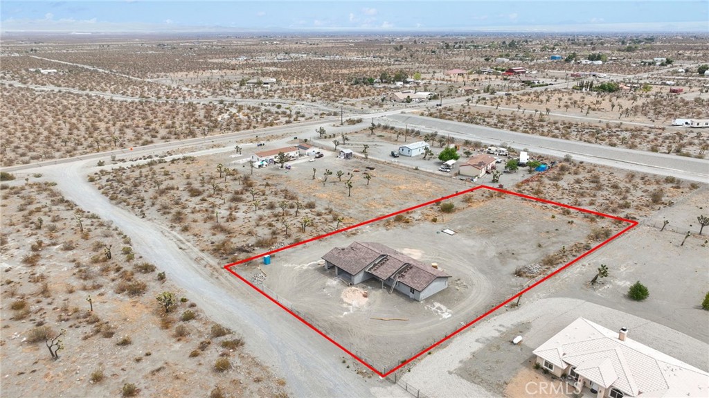 12015 Rosado Road Pinon Hills, CA 92372 - Photo 38 of 43 an aerial view of residential houses with outdoor space