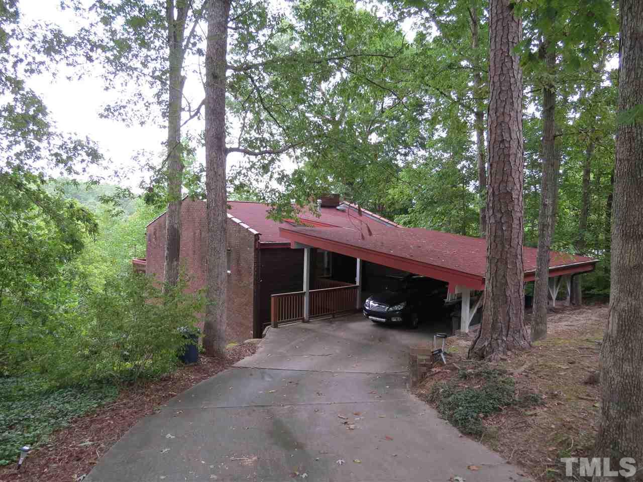 4308 Azalea Drive Raleigh, NC 27612 - Photo 1 of 18 a view of a house with a yard and sitting area
