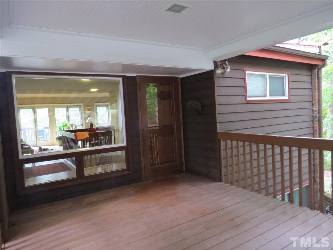 4308 Azalea Drive Raleigh, NC 27612 - Photo 16 of 18 a view of a house and a balcony