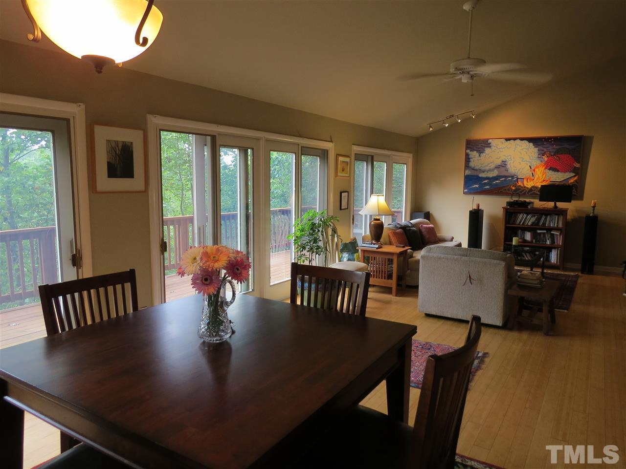 4308 Azalea Drive Raleigh, NC 27612 - Photo 4 of 18 a view of a dining room with furniture window and outside view