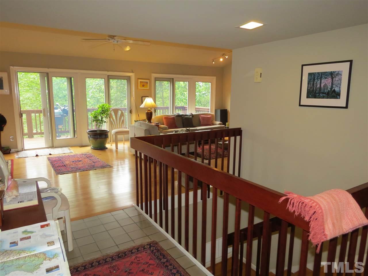 4308 Azalea Drive Raleigh, NC 27612 - Photo 6 of 18 a view of a dining room with furniture window and wooden floor