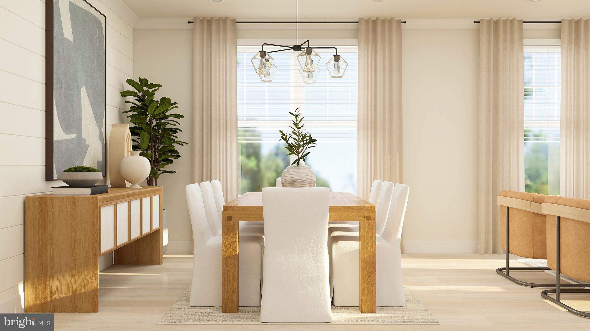 19015 Meadow Sun Way Boyds, MD 20841 - Photo 14 of 44 a dining room with chandelier and wooden floor