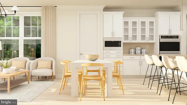 a living room with furniture a flat screen tv and next to a window