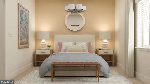 a bedroom with a bed and a painting on the wall