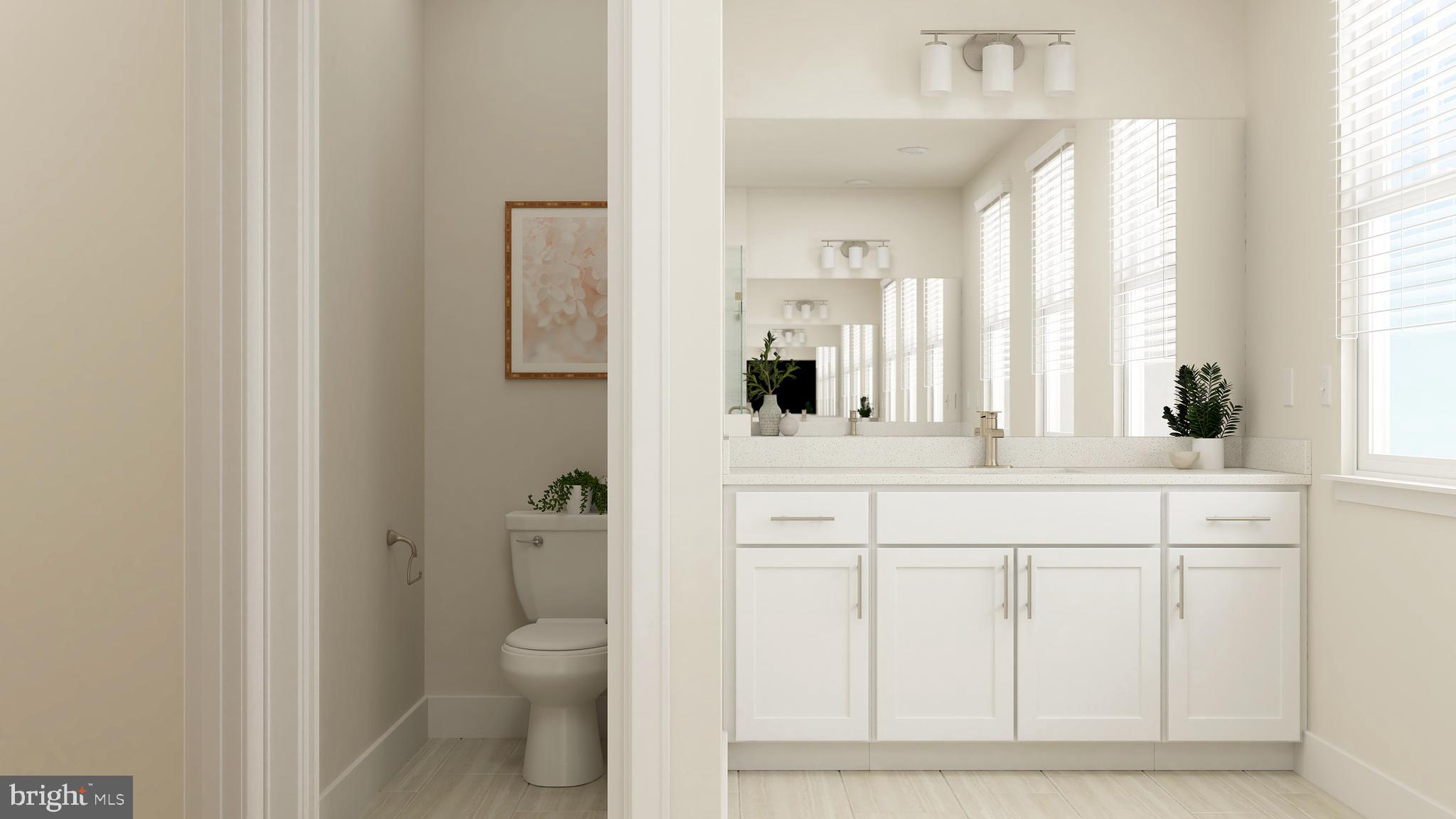 19015 Meadow Sun Way Boyds, MD 20841 - Photo 35 of 44 a bathroom with a sink a toilet and a window