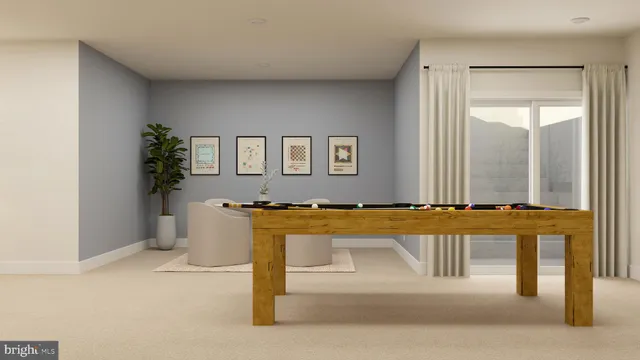 a view of a living room and a balcony