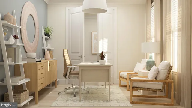 a living room with furniture a fireplace and a large window