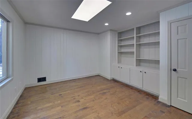 an empty room with a empty shelves