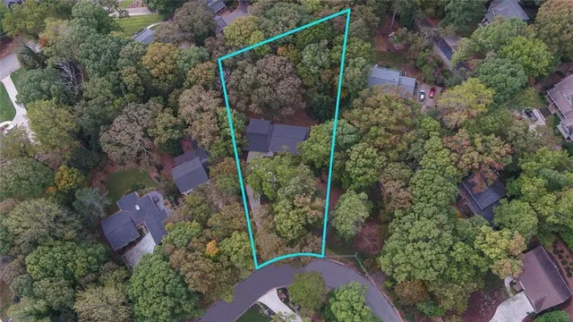 an aerial view of house with yard