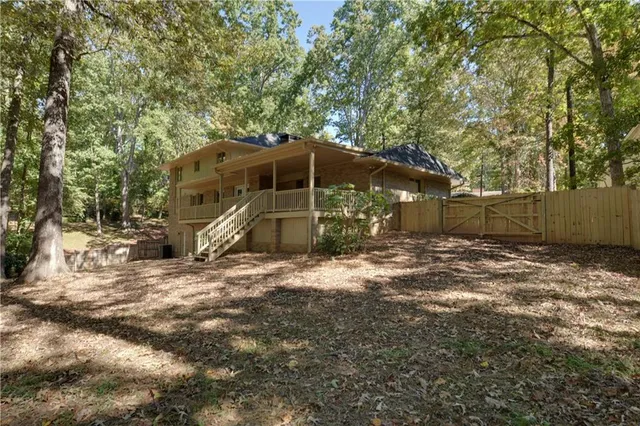 a view of an empty room with a fireplace