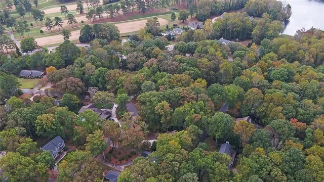 an aerial view of house with yard