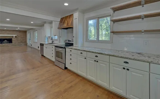 a large kitchen with cabinets