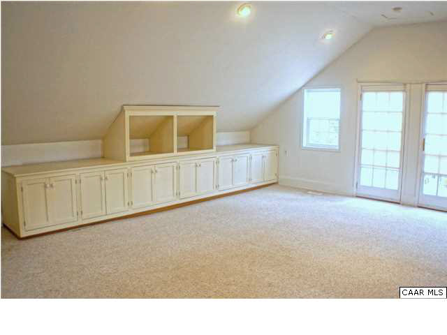 5445 Louisa Road Keswick, VA 22947 - Photo 17 of 39 a living room with furniture and a window