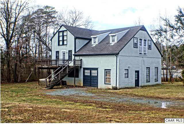5445 Louisa Road Keswick, VA 22947 - Photo 38 of 39 a front view of a house with a yard