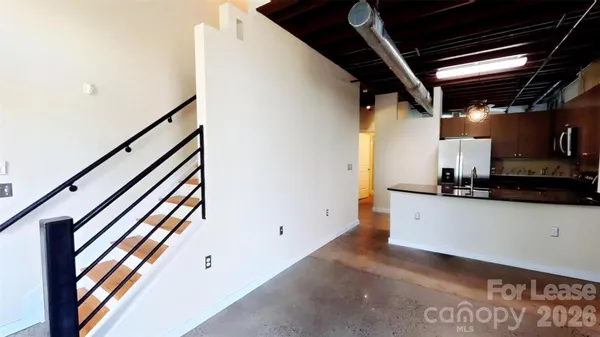 a view of living room with washer and dryer