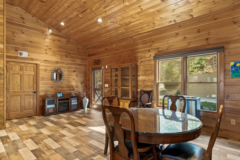 45 Turning Lay Road Morganton, GA 30560 - Photo 12 of 48 a dining room with furniture window and wooden floor
