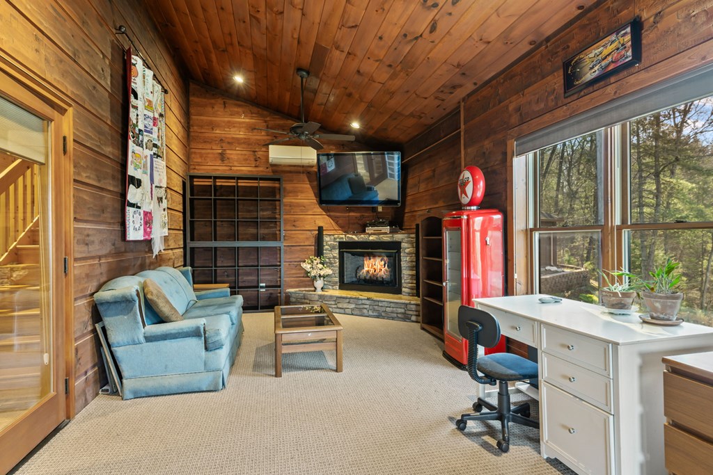 45 Turning Lay Road Morganton, GA 30560 - Photo 19 of 48 a living room with fireplace furniture and a large window