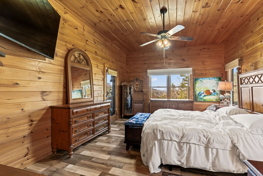 45 Turning Lay Road Morganton, GA 30560 - Photo 26 of 48 a bed sitting in a bedroom next to a window