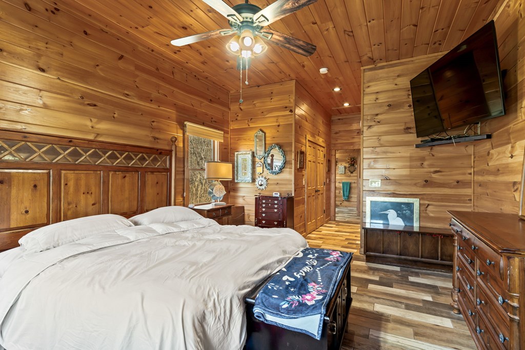 45 Turning Lay Road Morganton, GA 30560 - Photo 27 of 48 a bed room with a bed and a television
