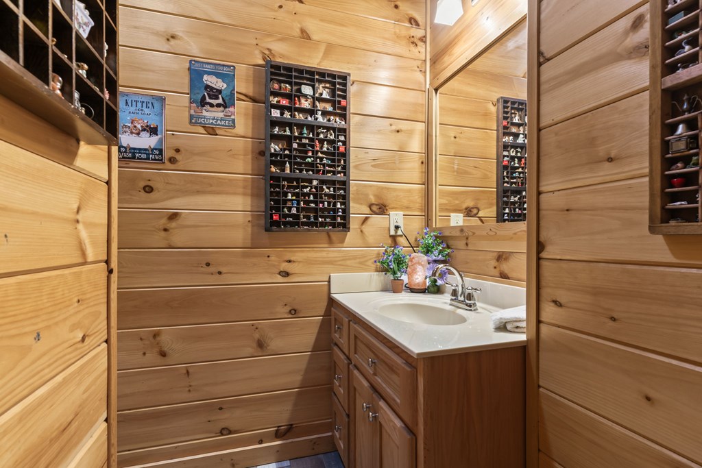45 Turning Lay Road Morganton, GA 30560 - Photo 31 of 48 a bathroom with a sink and a mirror