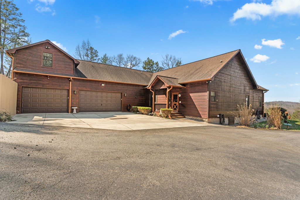 45 Turning Lay Road Morganton, GA 30560 - Photo 42 of 48 a front view of a house with a garage
