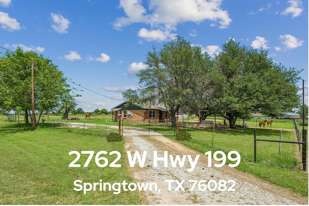 2762 West Highway 199 Springtown, TX 76082 - Photo 2 of 33 Gated circular drive entry to the house - 1-Acre Lot - Make sure to click on the 3D Virtual Tour for in-person walk-thru experience online 24-7. If you don't see it, contact the listing agent!