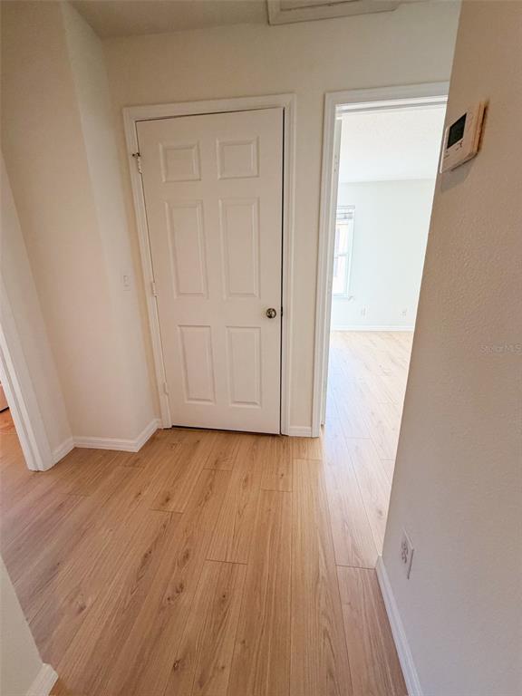 4747 Chatterton Way Riverview, FL 33578 - Photo 15 of 24 a view of a hallway in wooden floor