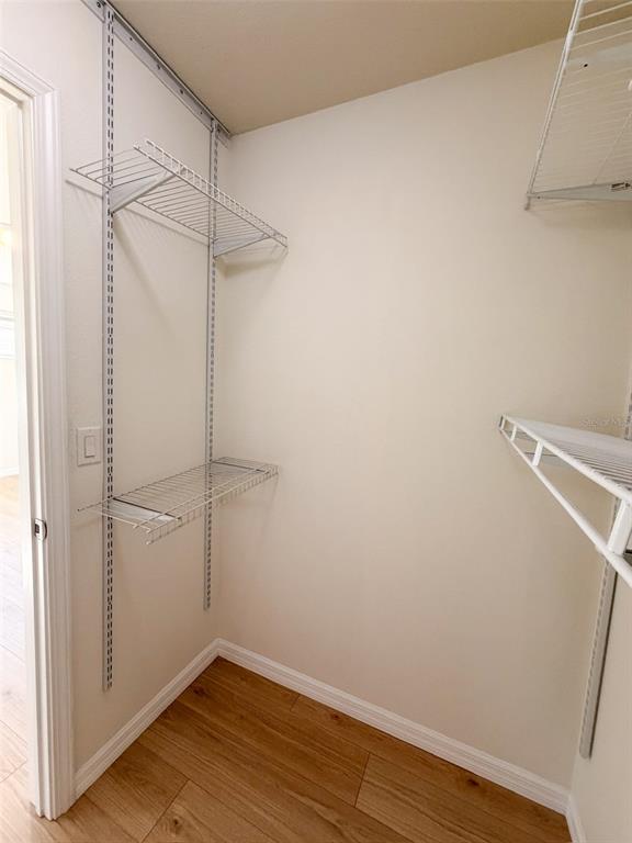 4747 Chatterton Way Riverview, FL 33578 - Photo 19 of 24 a view of a room with wooden floor