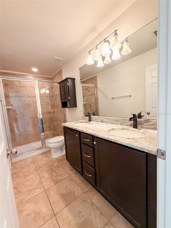 4747 Chatterton Way Riverview, FL 33578 - Photo 20 of 24 a bathroom with a sink a large mirror and a shower