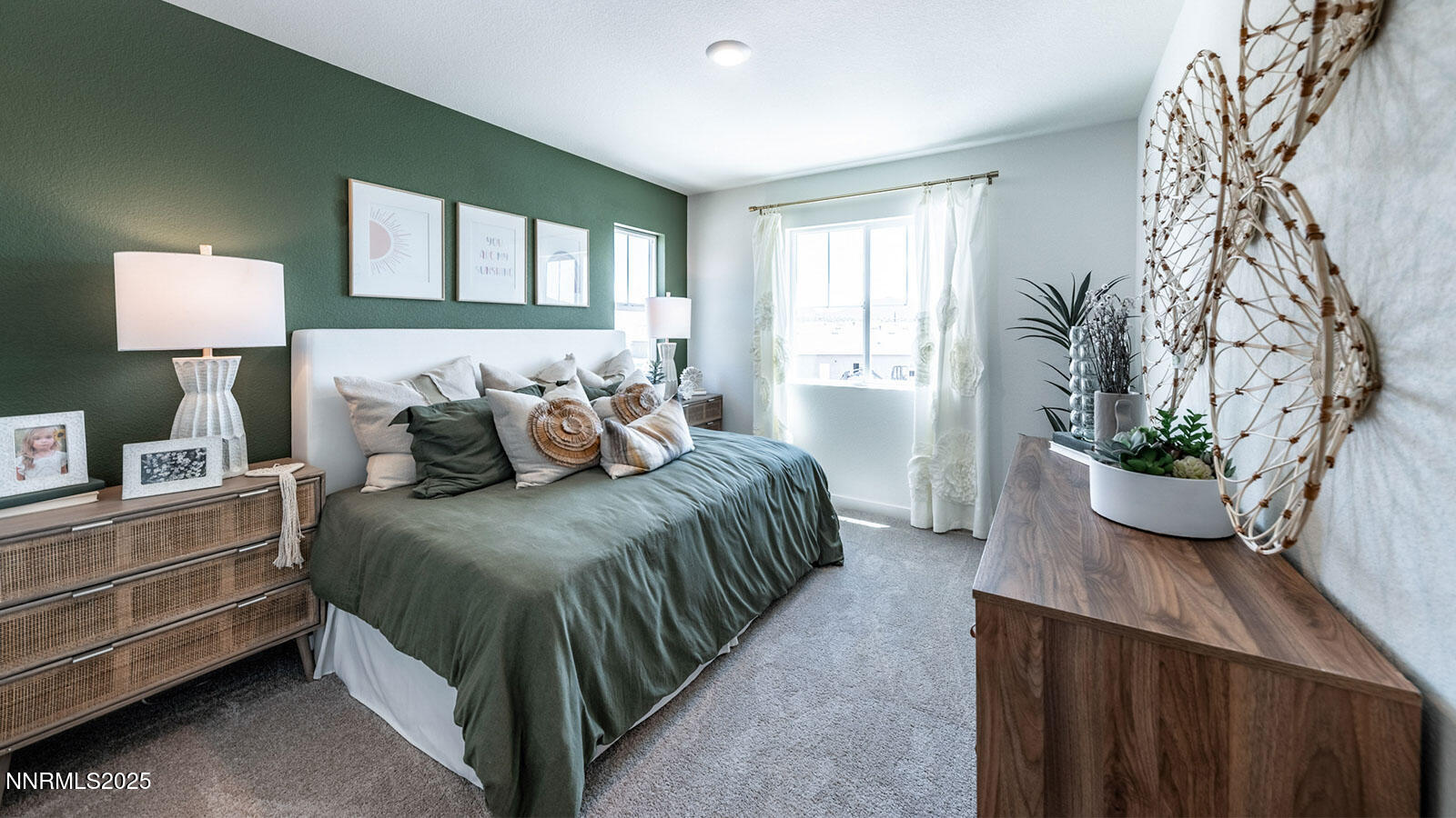 7540 Editor Drive Reno, NV 89506 - Photo 19 of 22 a bedroom with a bed and a potted plant