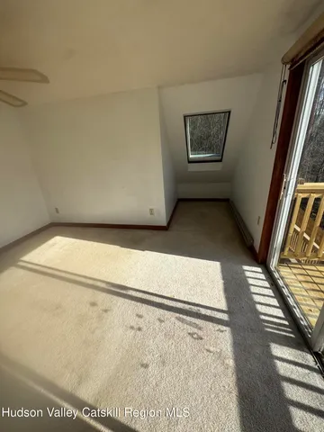 a view of a room with an empty space