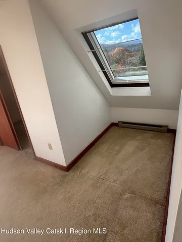 a view of backyard with cabin