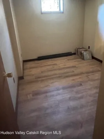 a view of pathway along with wooden floor