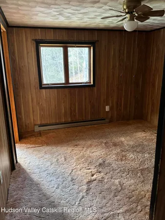 a aerial view of a house with a yard