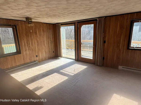 an empty room with windows