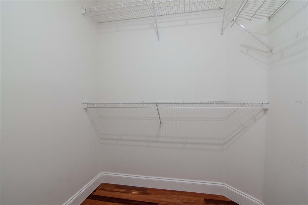 4938 Yellowstone Drive New Port Richey, FL 34655 - Photo 19 of 51 a view of small space with racks on the wall