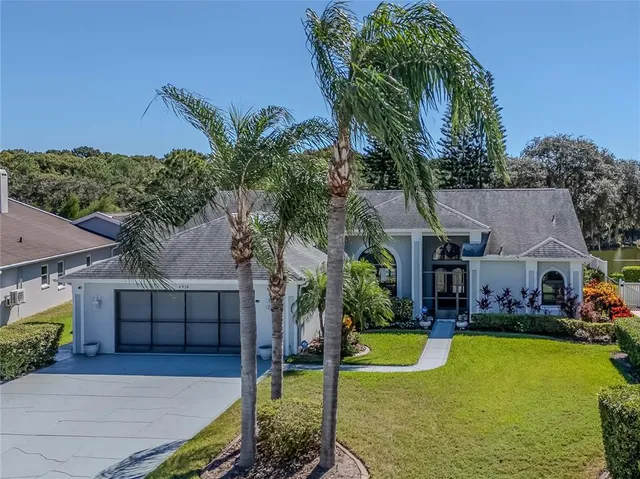 a view of a house with swimming pool