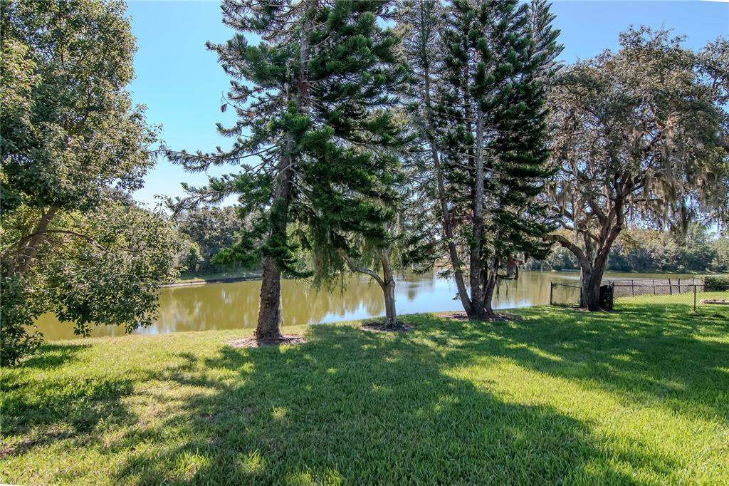 4938 Yellowstone Drive New Port Richey, FL 34655 - Photo 34 of 51 a view of outdoor space with deck and garden