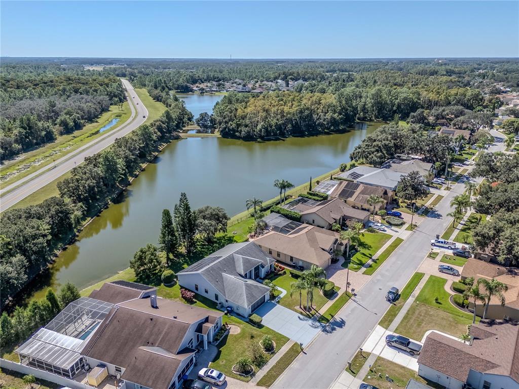 4938 Yellowstone Drive New Port Richey, FL 34655 - Photo 43 of 51 an aerial view of a city with houses