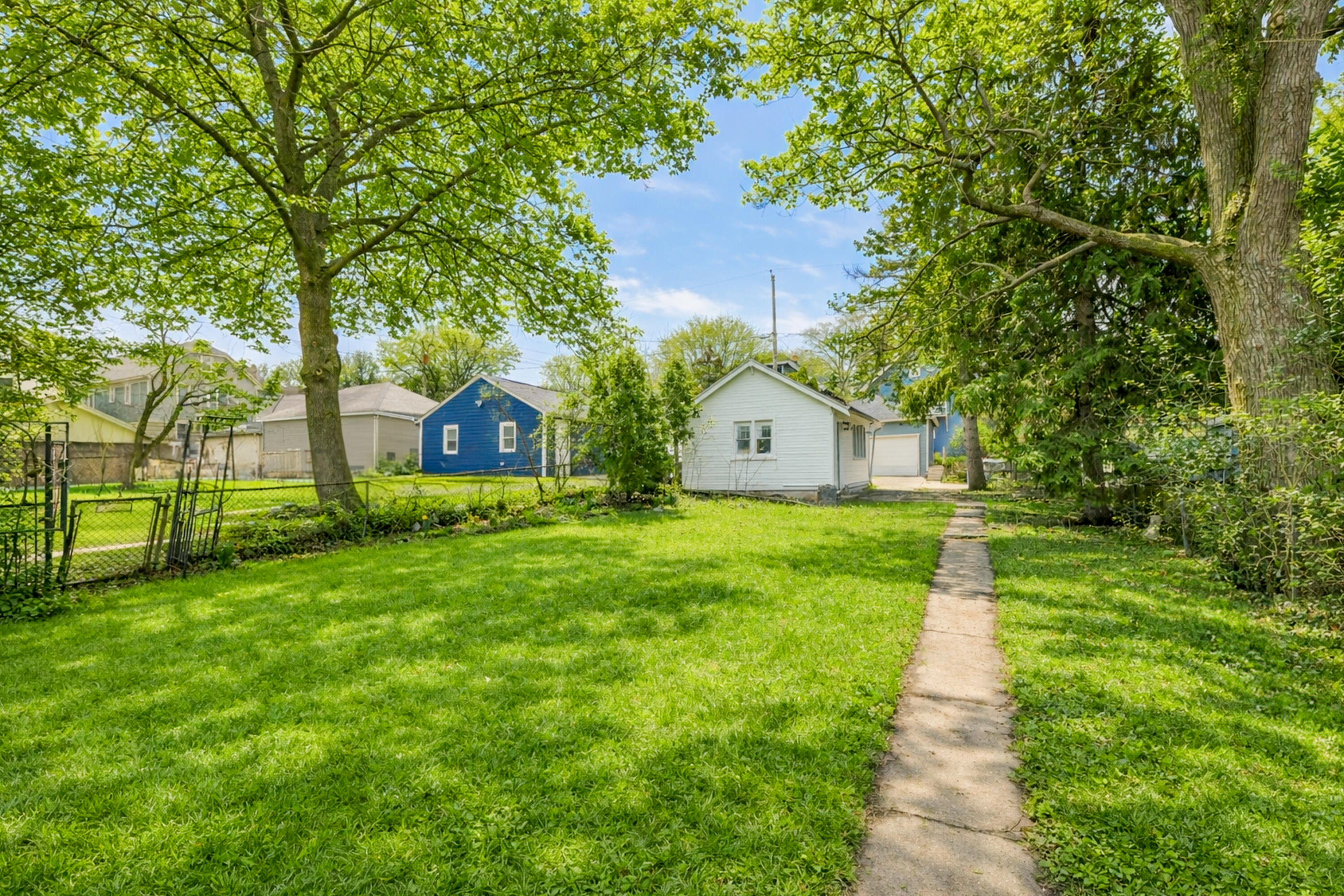 1526 North Hawley Road, Unit 1528 Milwaukee, WI 53208 - Photo 26 of 30 Digitally enhanced grass & trees