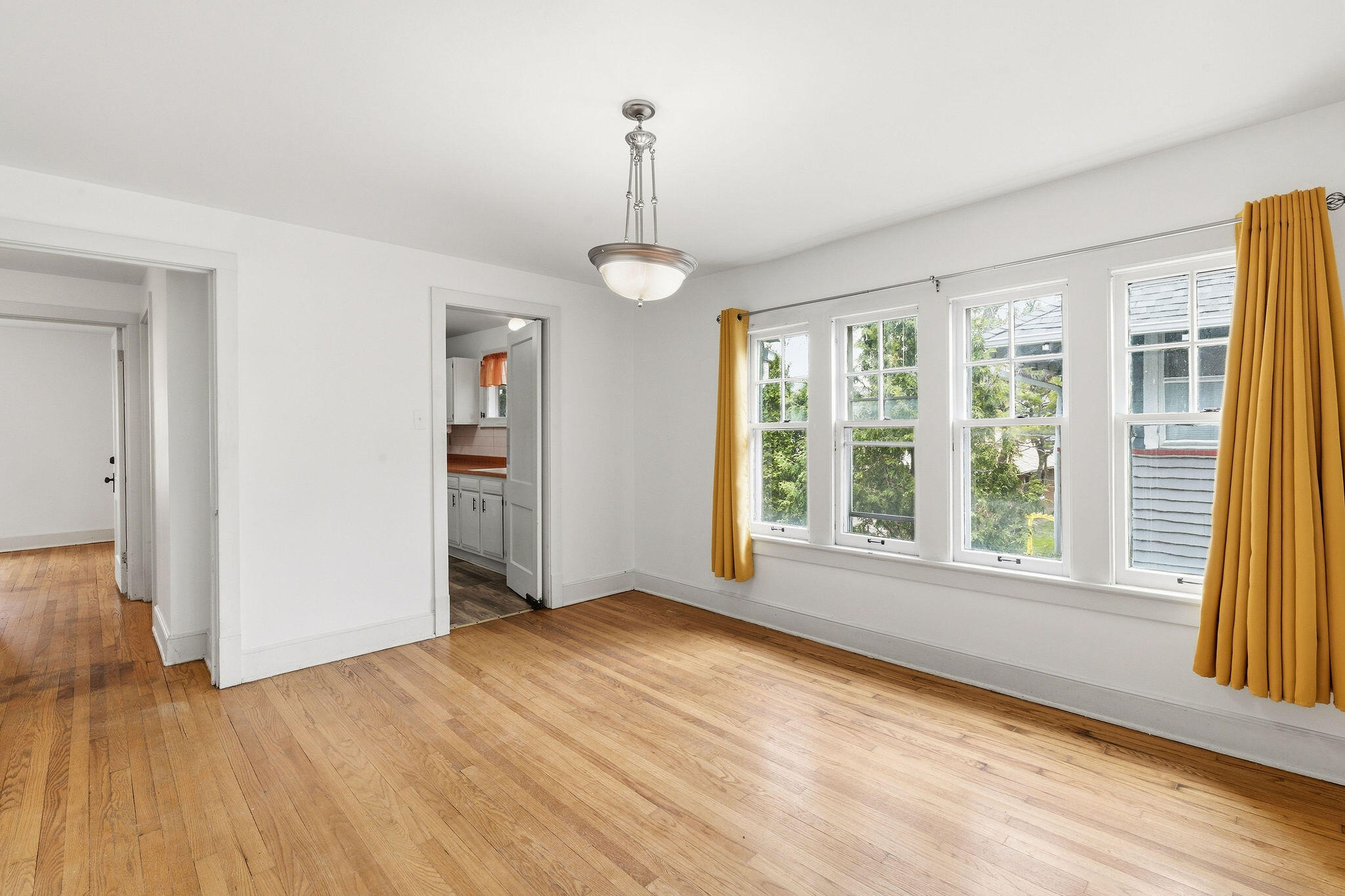1526 North Hawley Road, Unit 1528 Milwaukee, WI 53208 - Photo 5 of 30 Between Living Room, Kitchen, and Bedroom Hall