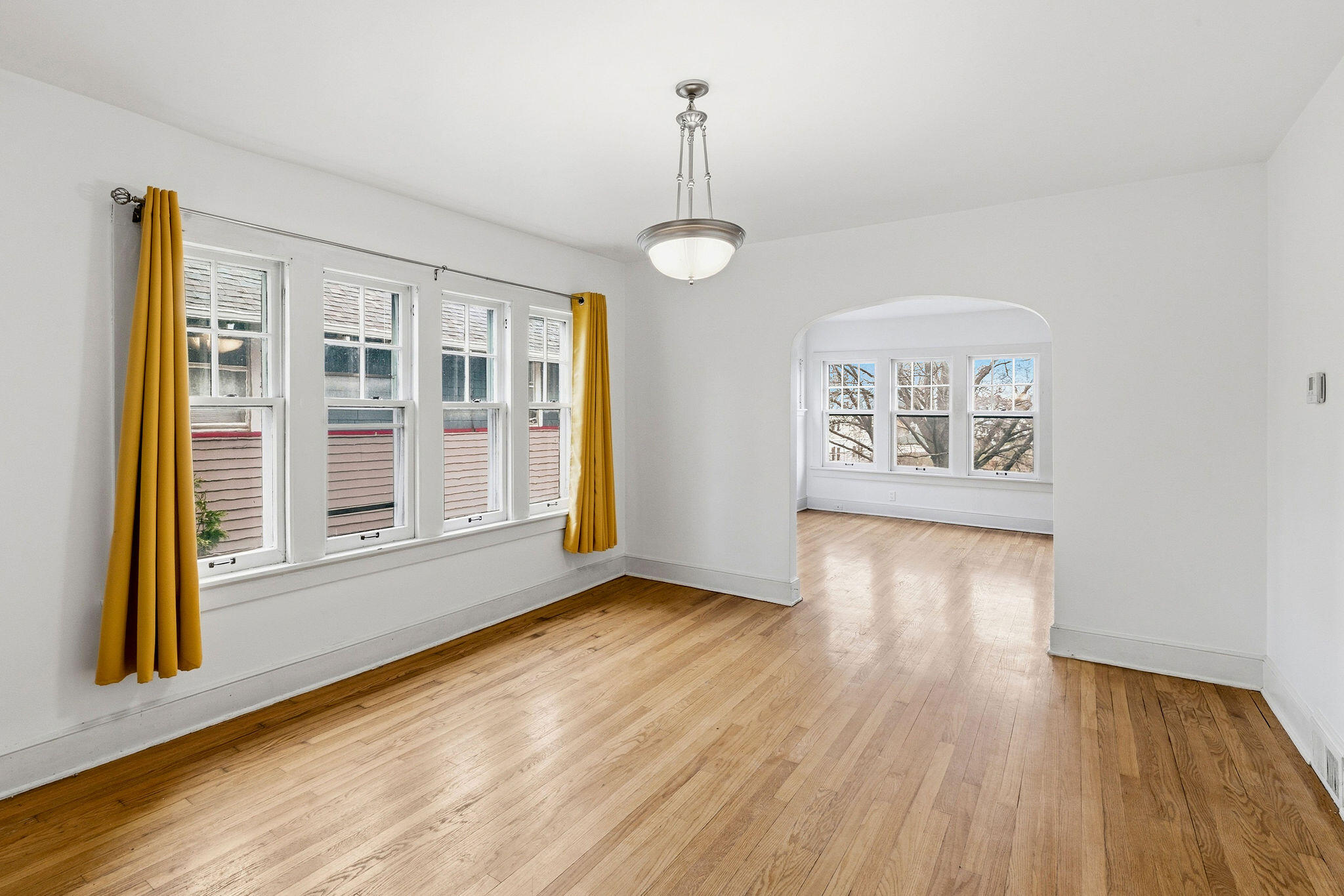 1526 North Hawley Road, Unit 1528 Milwaukee, WI 53208 - Photo 6 of 30 Great natural light and archway