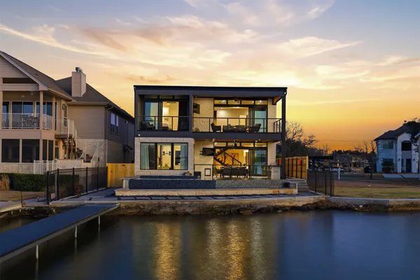 a front view of a house with glass windows