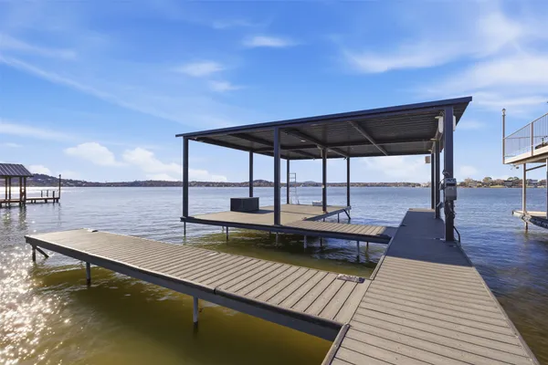 a view of sitting area with furniture and wooden floor