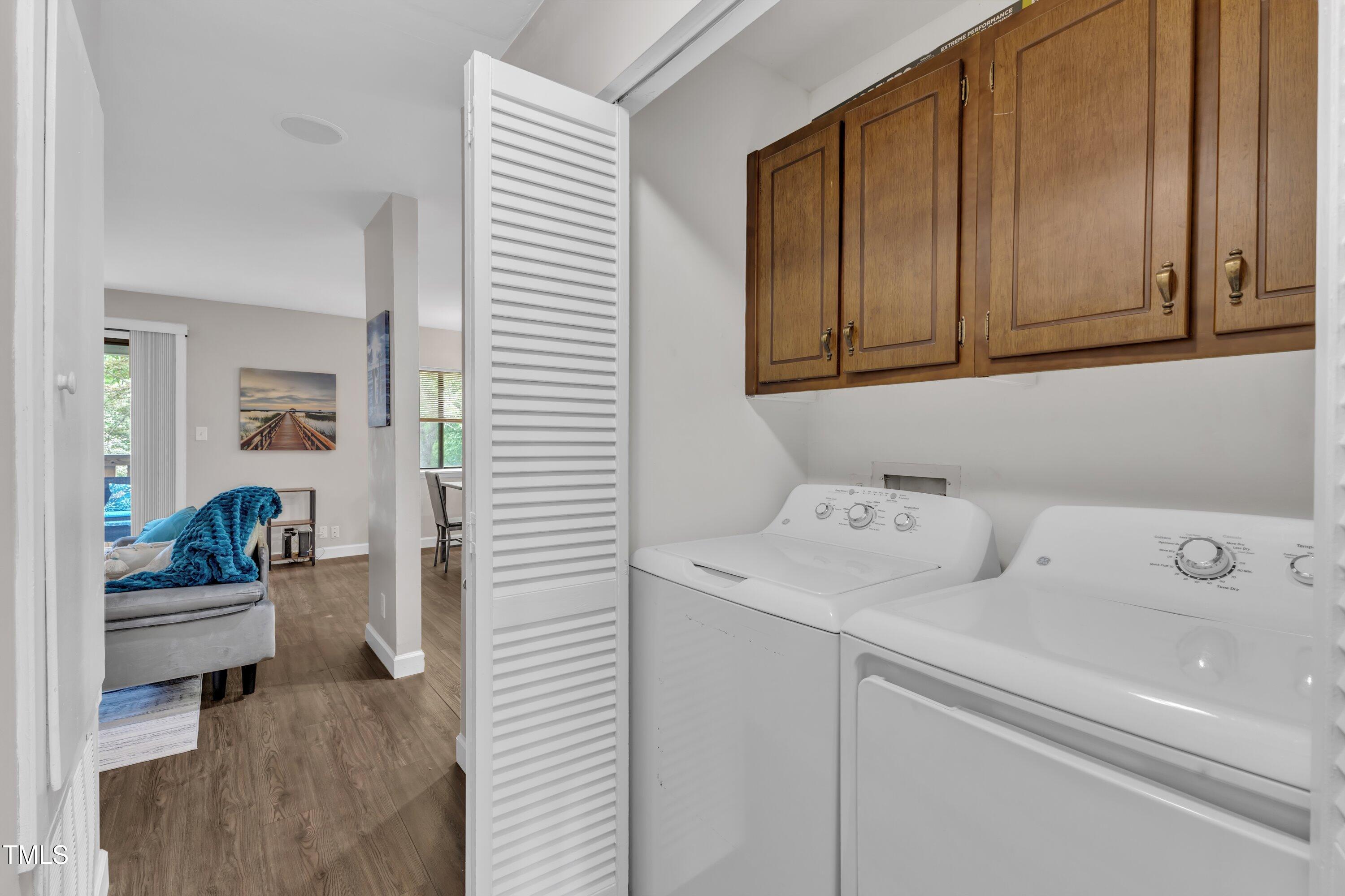 5022 Flint Ridge Place Raleigh, NC 27609 - Photo 23 of 32 a utility room with dryer and washer