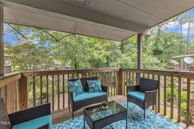 a view of a two chairs in the deck