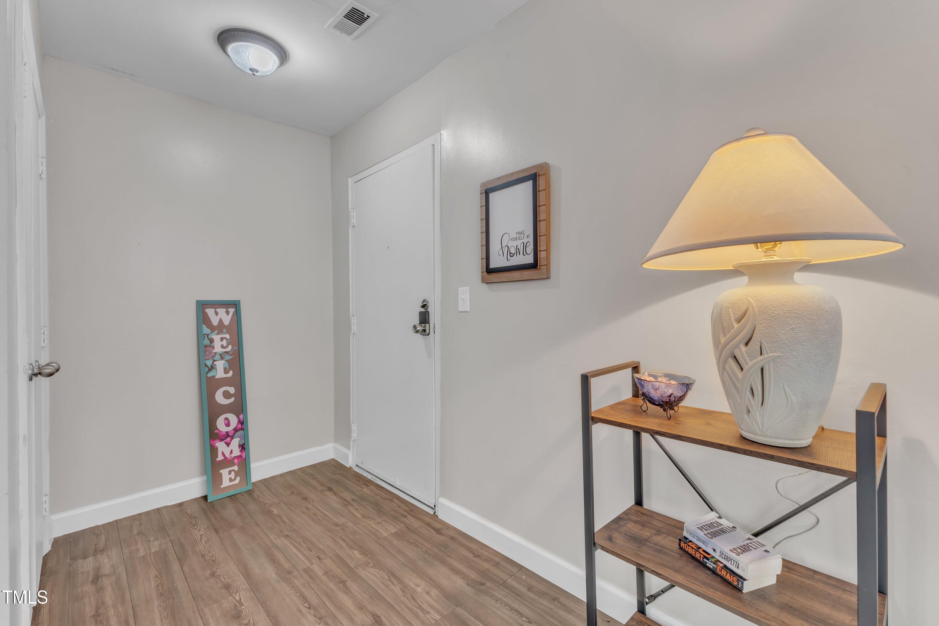 5022 Flint Ridge Place Raleigh, NC 27609 - Photo 5 of 32 a view of an empty room