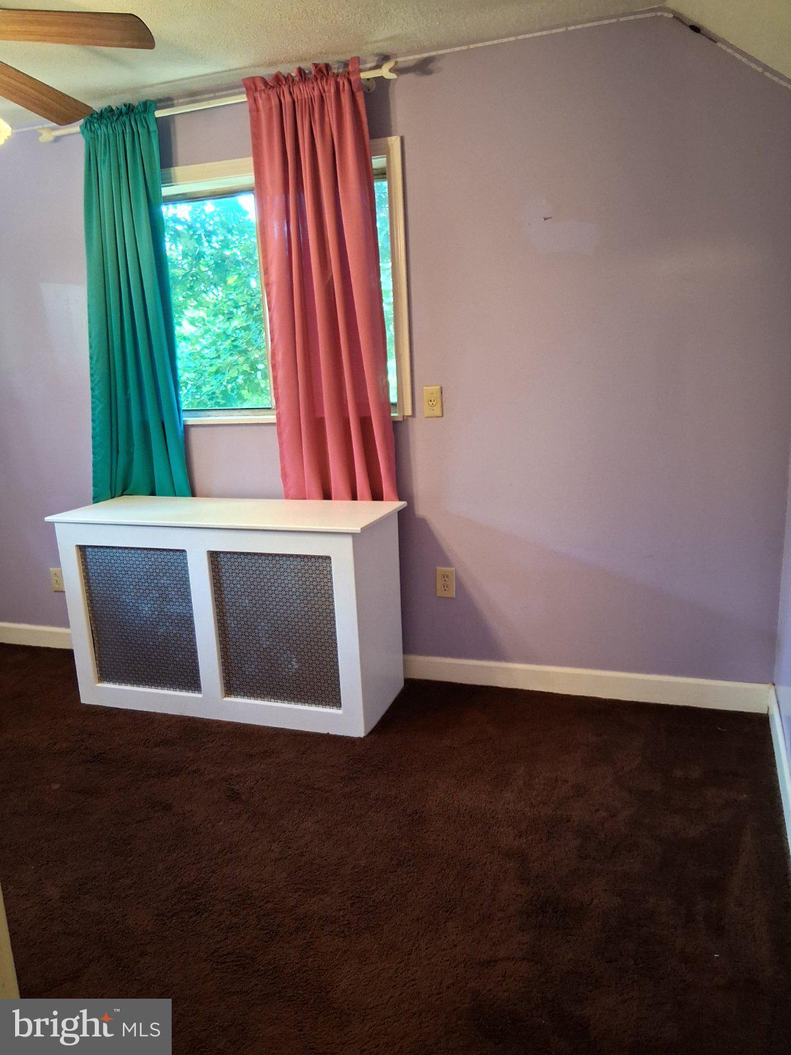 265 View Street Johnstown, PA 15902 - Photo 48 of 66 Charming room with vibrant curtains.