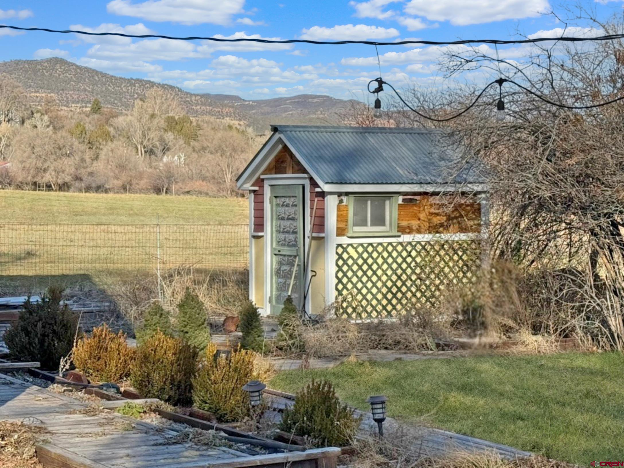 458 Price Road Paonia, CO 81428 - Photo 40 of 44 a view of a terrace with a garden